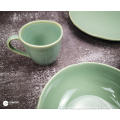 Reactive glazed stoneware dinner set in Jade green